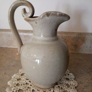 Sand colored pitcher ( clay pottery)